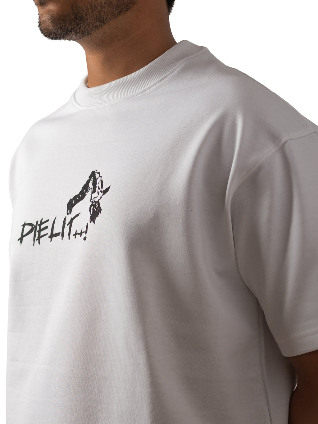 Person wearing a white t-shirt with a black logo on a white background